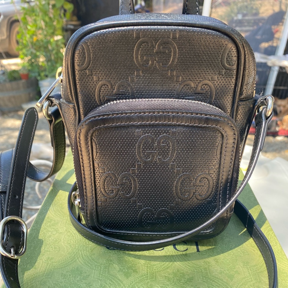 Gucci GG embossed mini bag